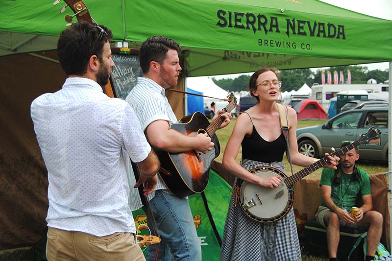 sierra nevada logo on tent behind performers