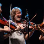 Sam Bush with Darol Anger, photo by Jay Strausser